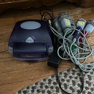 Purple Karaoke Machine with CD Collection